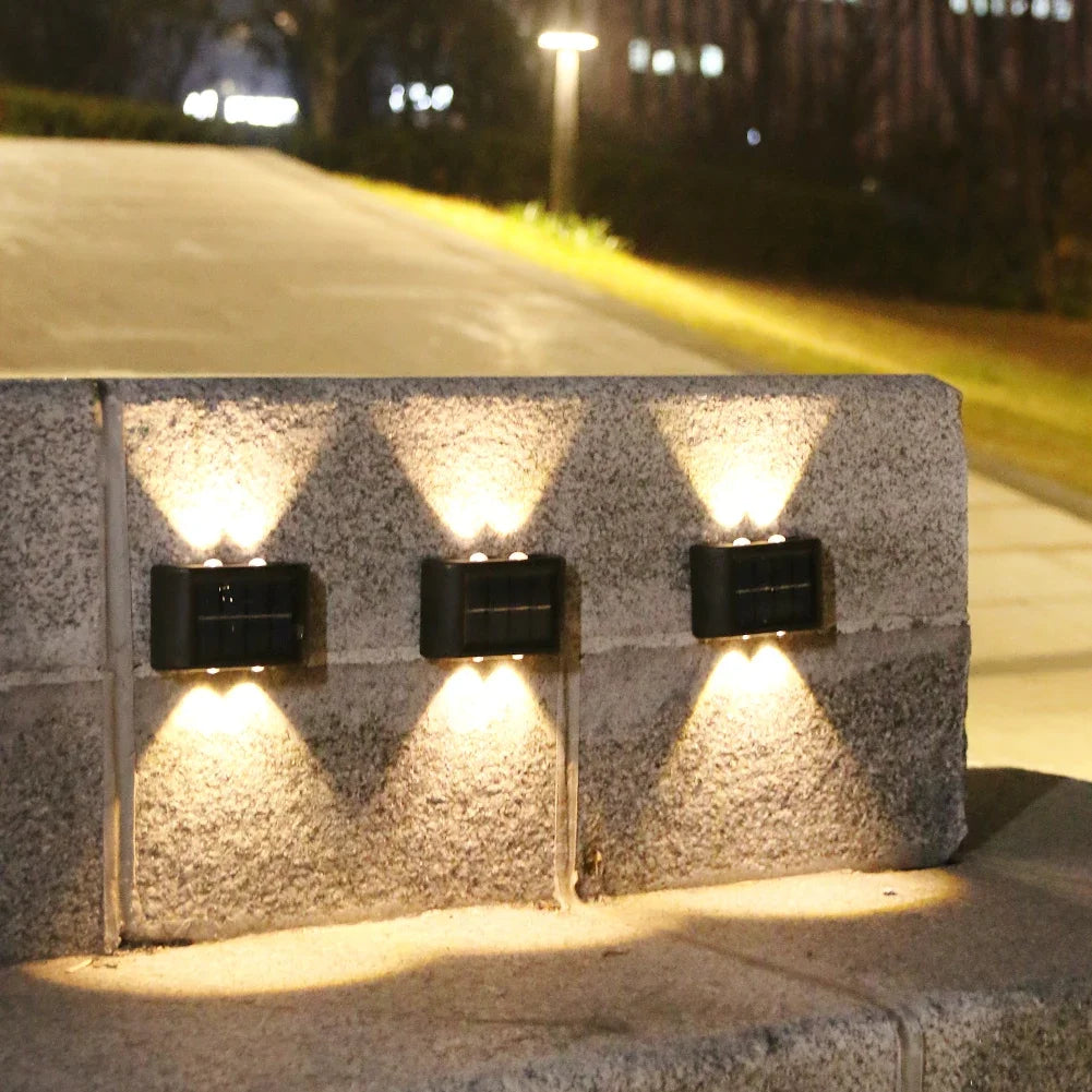 LUMIGUARD Applique murale solaire extérieure à lumière chaude.
