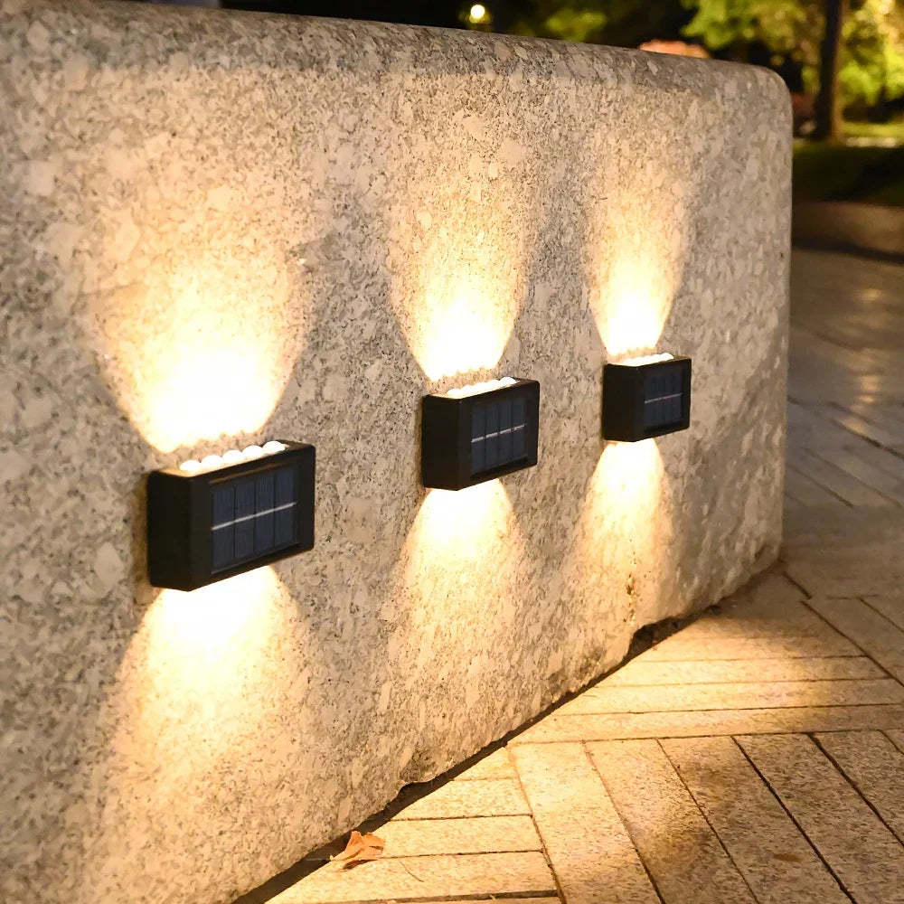 LUMIGUARD Applique murale solaire extérieure à lumière chaude.